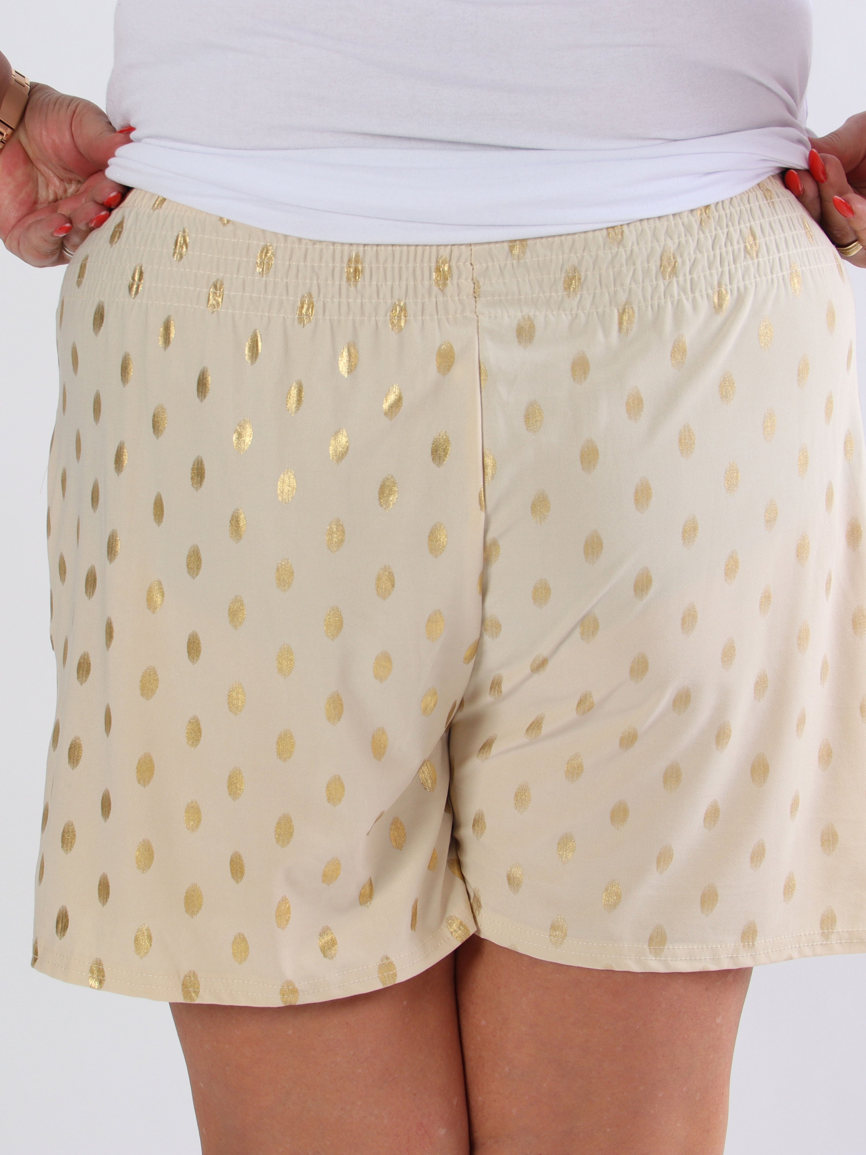 Pams Dot Shorts - Plus size shorts i stretchigt tyg med guldprickar